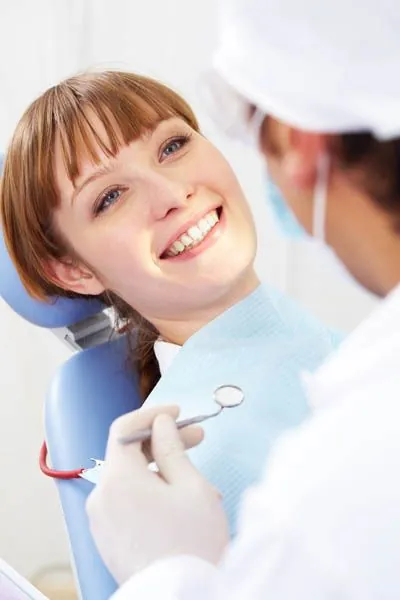 woman receiving dental care at Little Mountain Dental