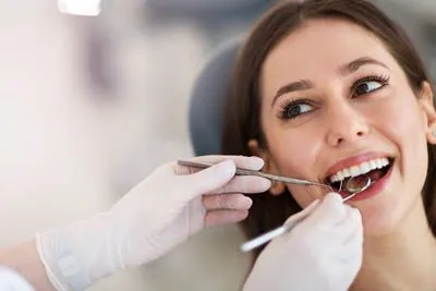 woman getting dental care at Little Mountain Dental